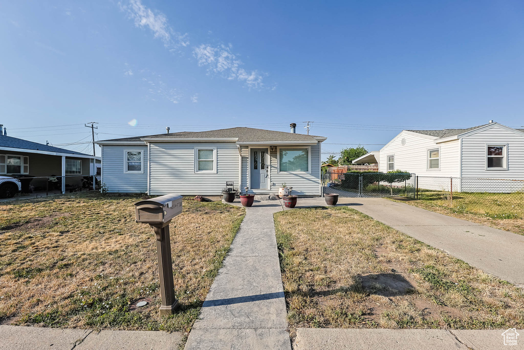 View of front of home featuring concrete driveway
