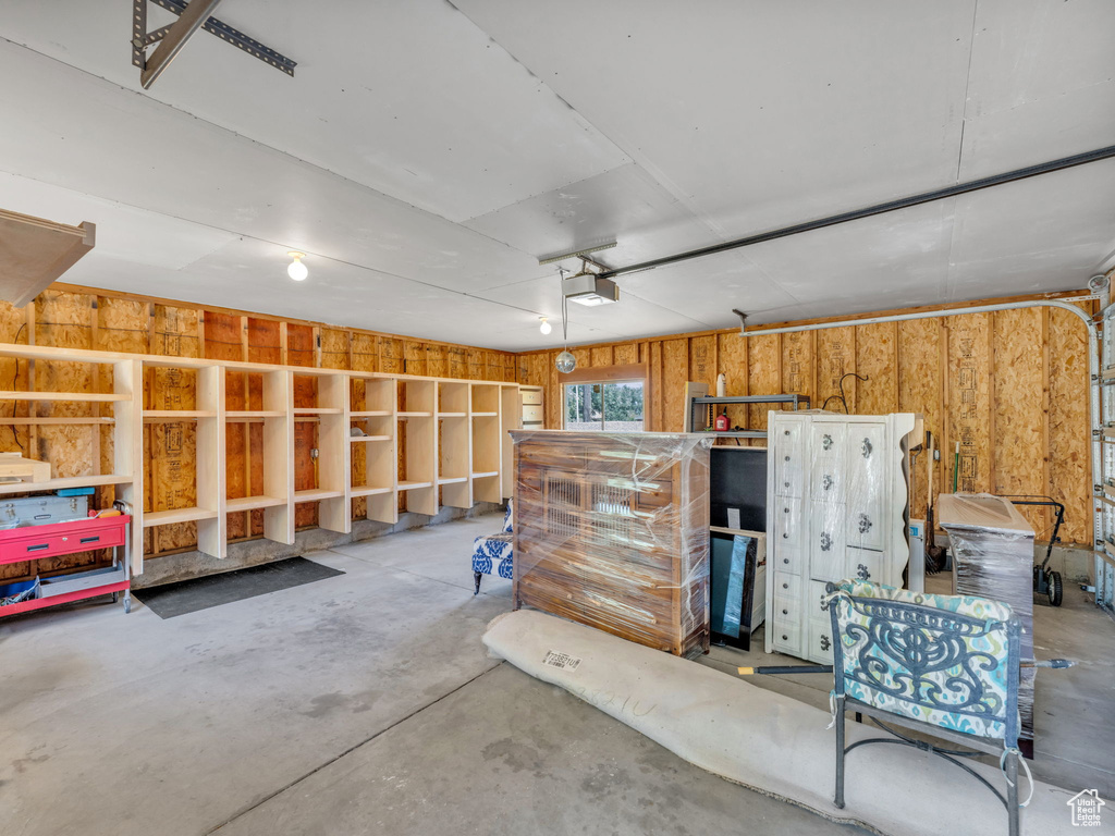 Garage featuring a garage door opener