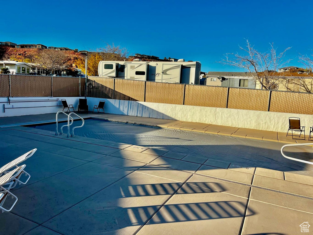 View of pool with a residential view