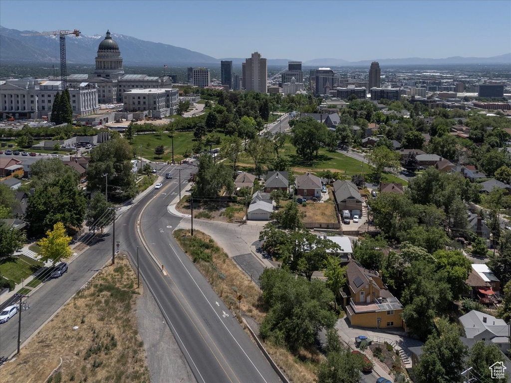 Aerial view of property\\\'s location featuring mountains and nearby urban area