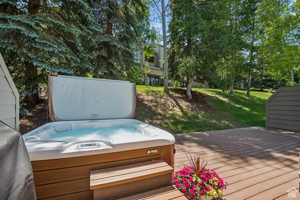Wooden deck with a hot tub