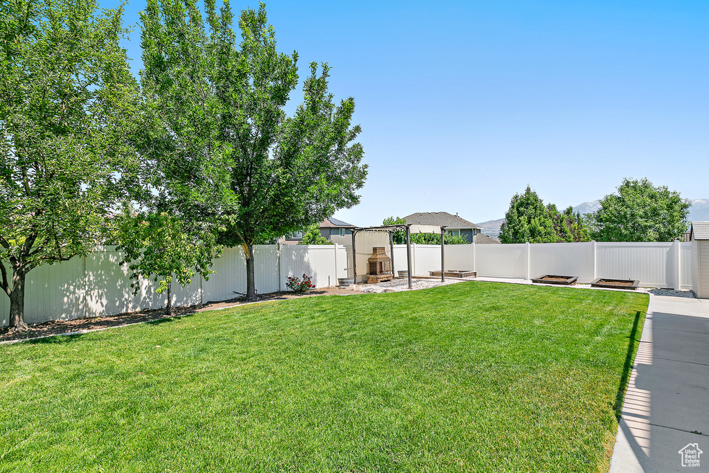View of fenced backyard