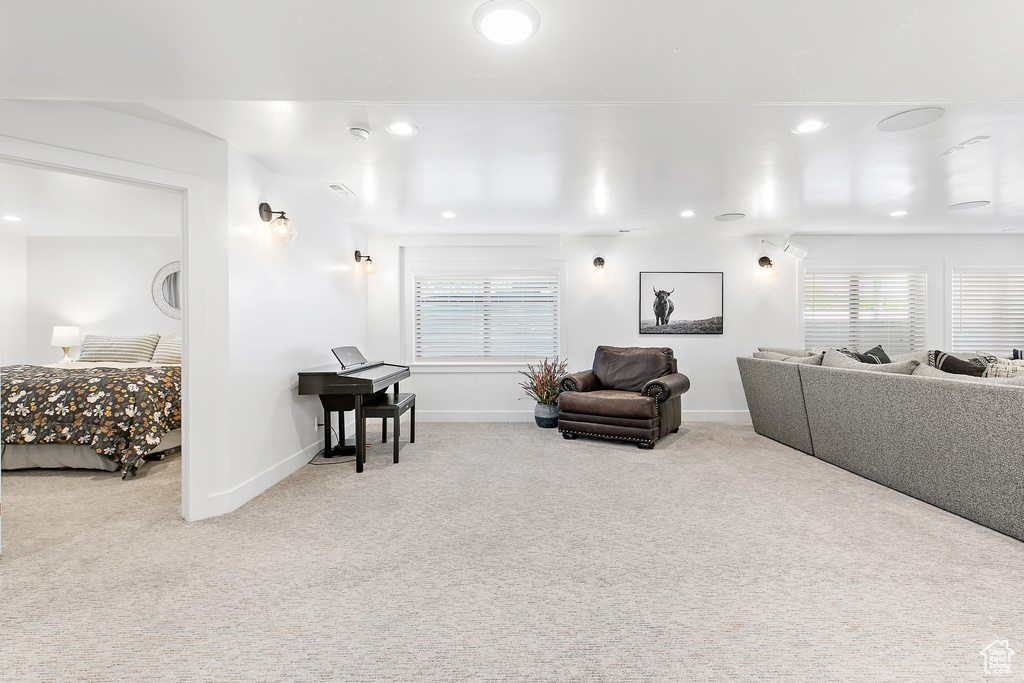 Living room with carpet floors and recessed lighting