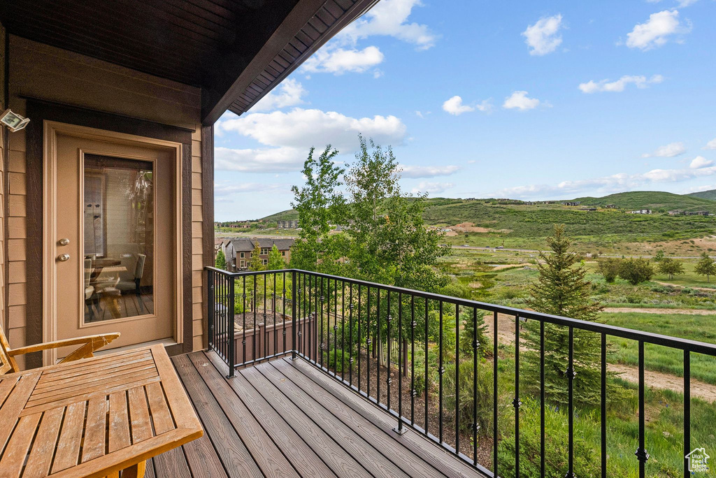 Balcony featuring a mountain view