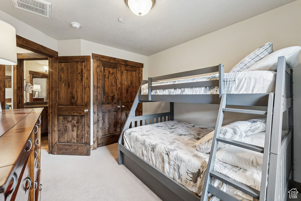 Bedroom featuring carpet