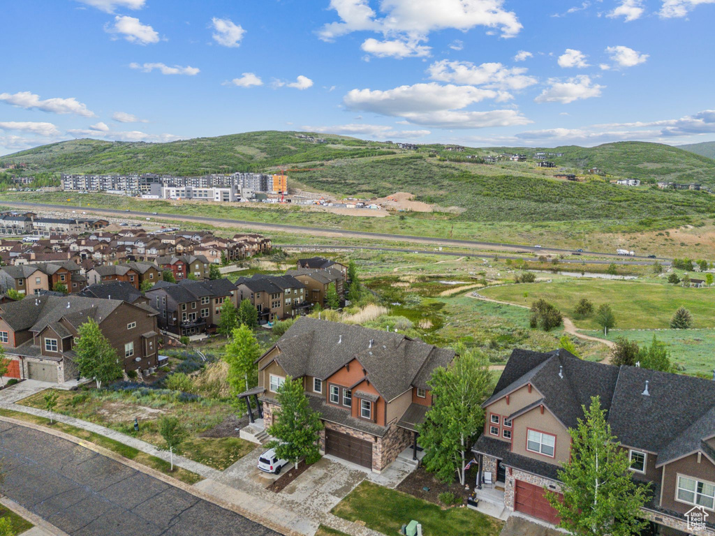 Aerial view of residential area with a mountain backdrop