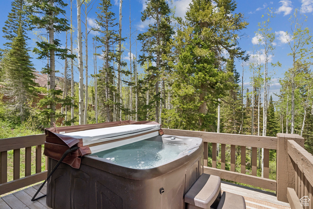 Wooden terrace with a hot tub