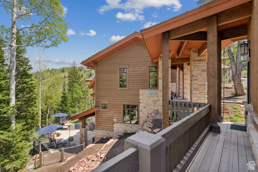 Deck featuring a forest view
