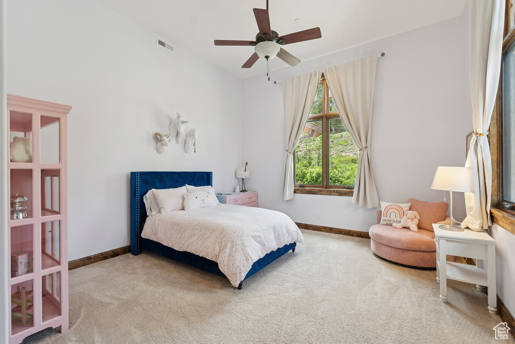 Bedroom featuring carpet floors and ceiling fan