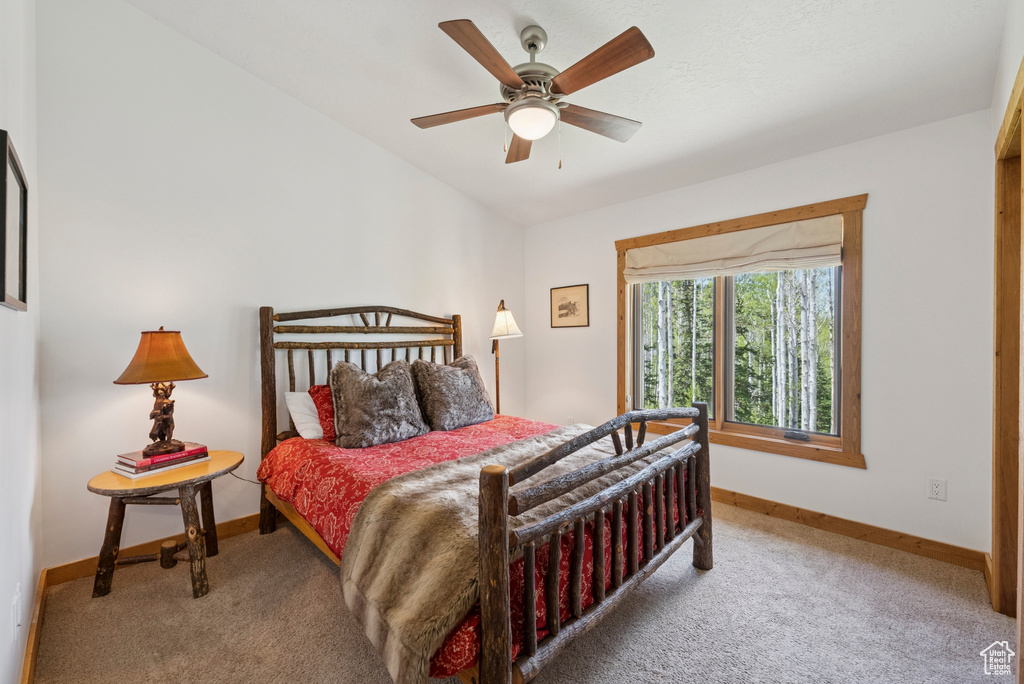 Bedroom featuring carpet flooring and ceiling fan
