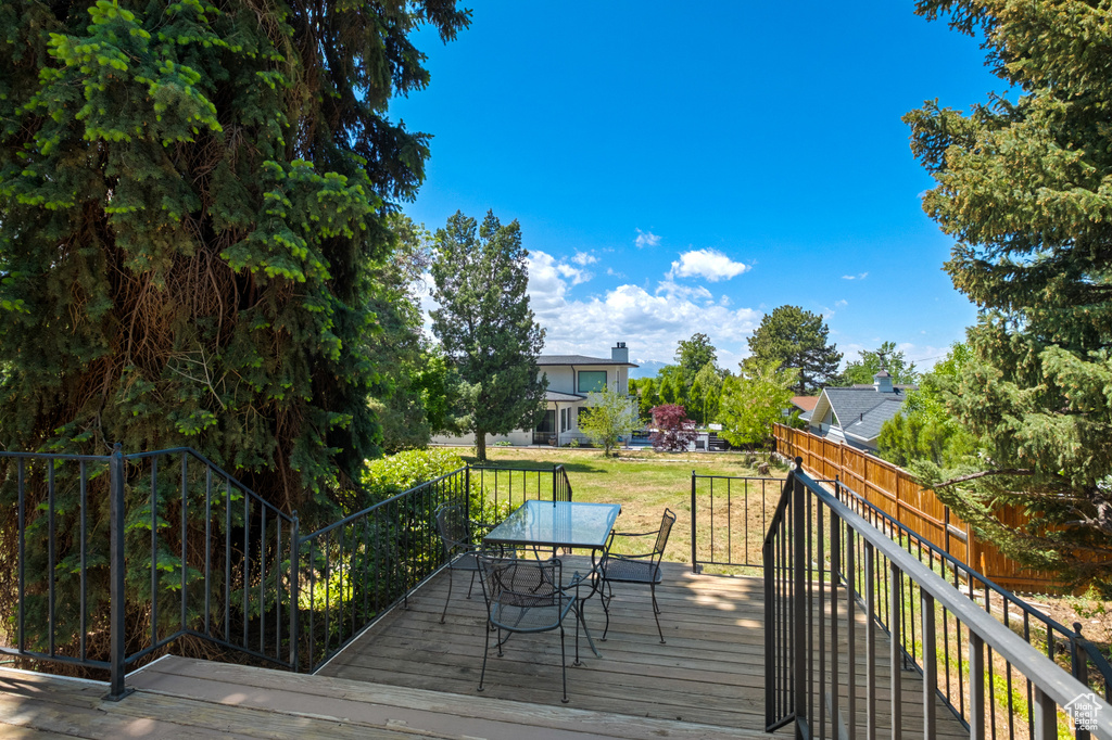Wooden deck with outdoor dining area