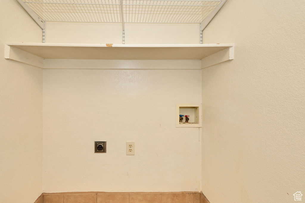 Laundry area with hookup for an electric dryer and hookup for a washing machine