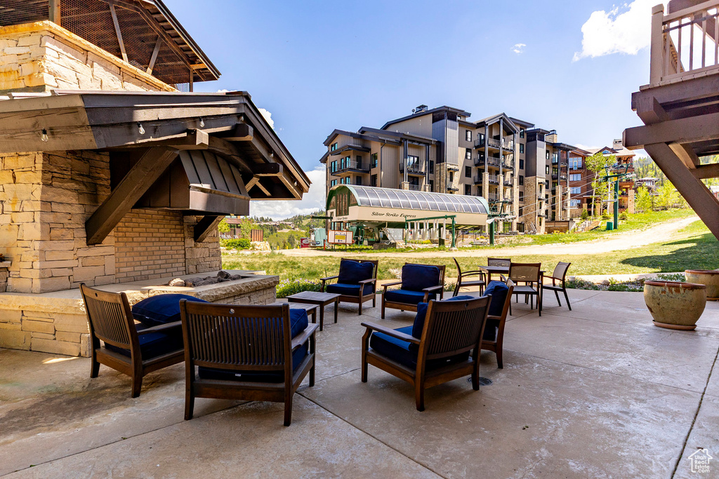 View of patio with an outdoor living space