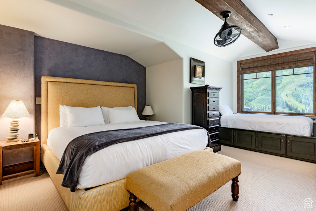 Bedroom with light carpet