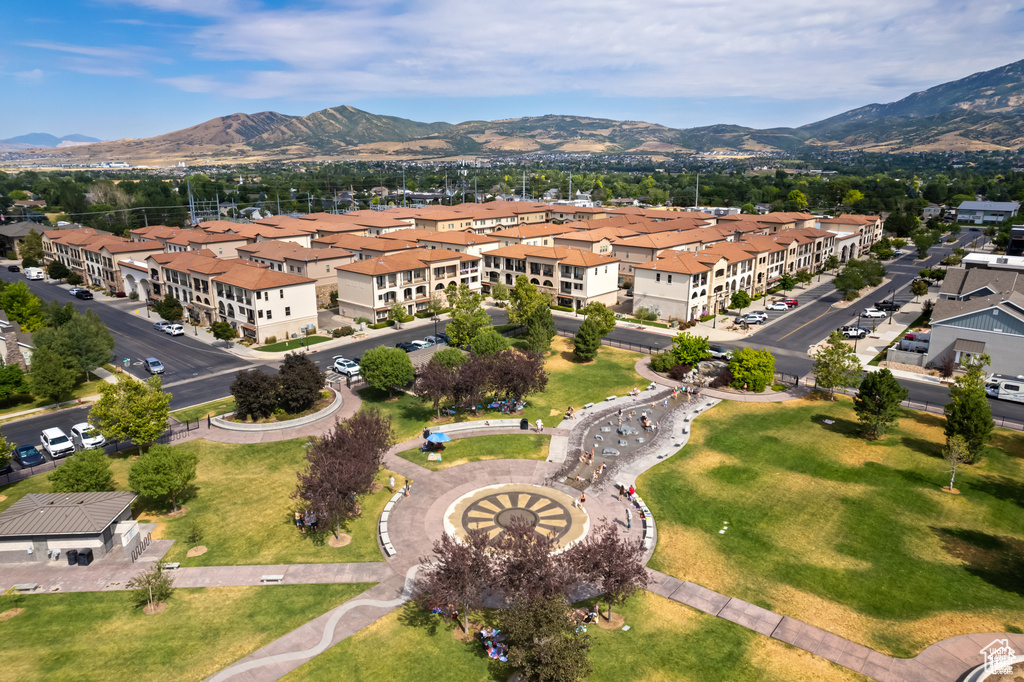 Aerial perspective of suburban area with a mountain backdrop