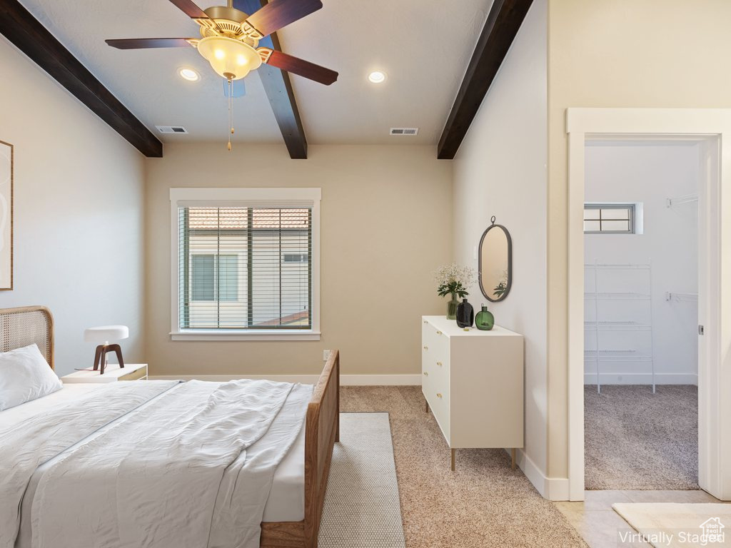 Bedroom featuring beam ceiling, light carpet, multiple windows, recessed lighting, and ceiling fan