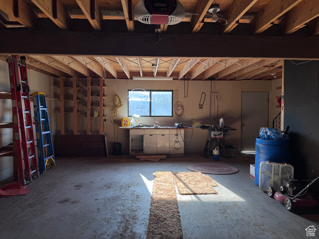 Garage featuring a garage door opener