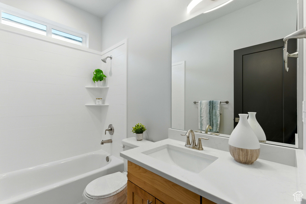 Full bathroom featuring vanity and shower / bathtub combination