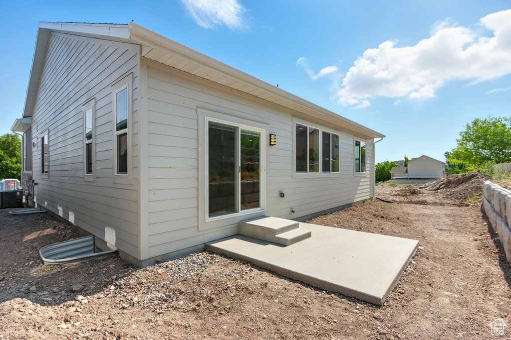 Back of property featuring a patio