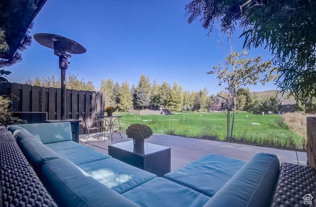 View of patio featuring an outdoor hangout area