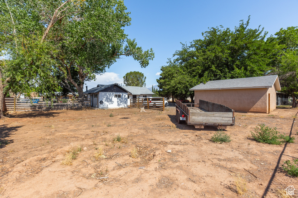 View of yard with an outbuilding