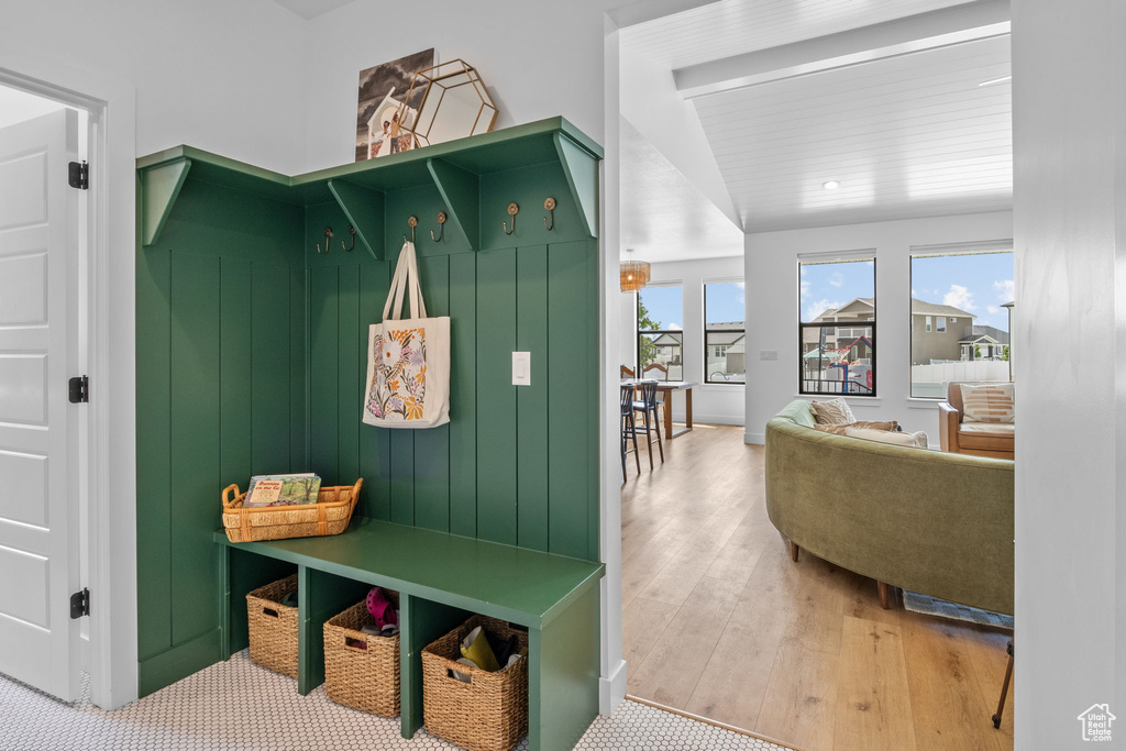 Mudroom featuring wood finished floors