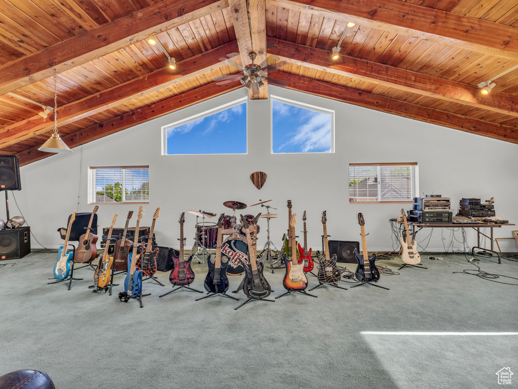 Garage featuring wooden ceiling and ceiling fan
