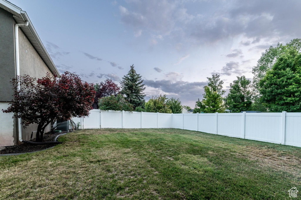 View of fenced backyard