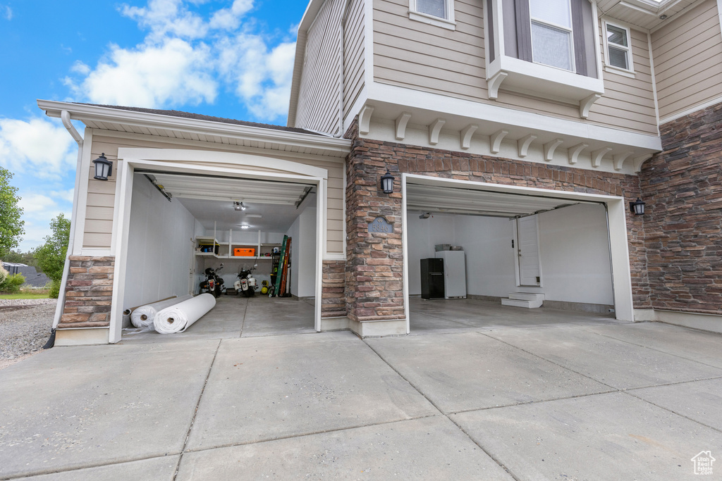 Garage featuring driveway