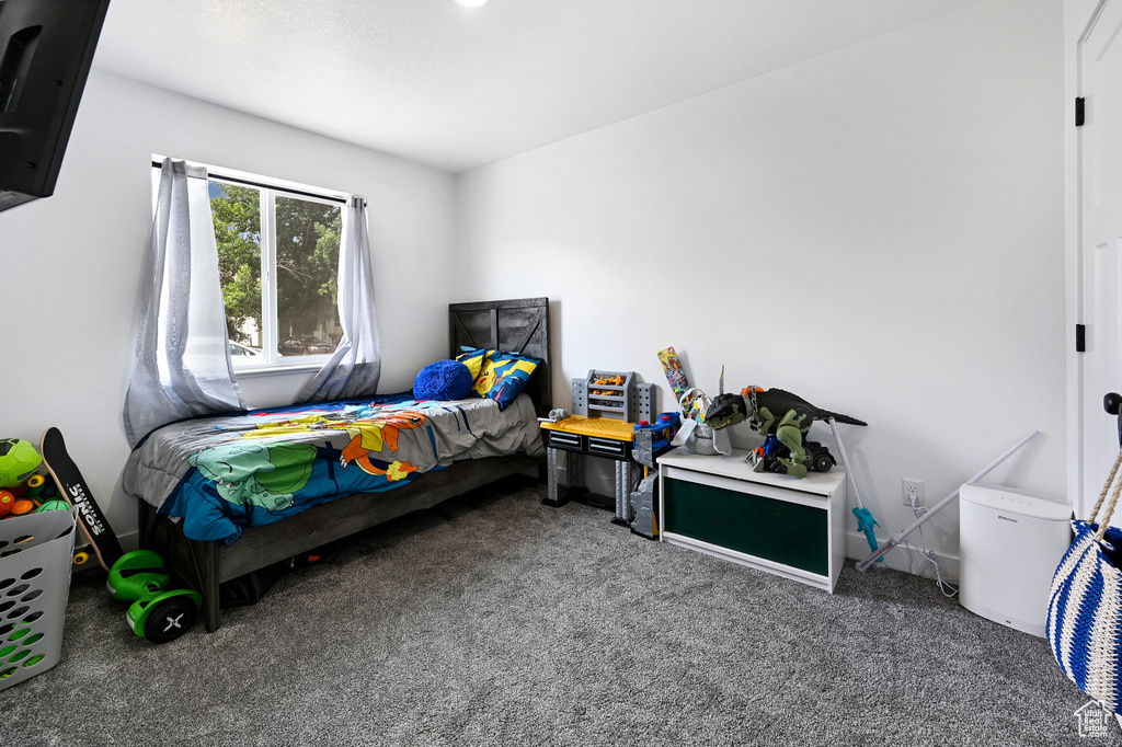 Bedroom featuring carpet