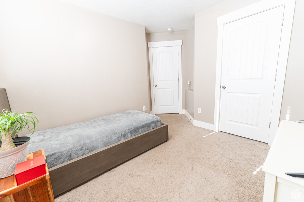 View of carpeted bedroom