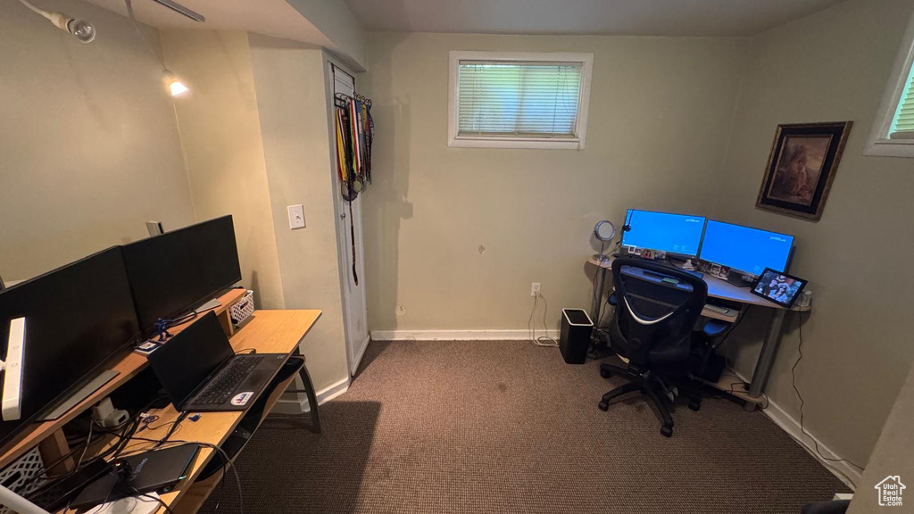 Office featuring carpet and baseboards