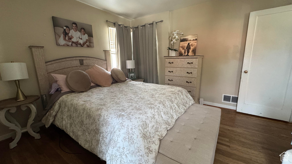 Bedroom featuring wood finished floors