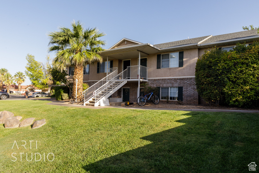 View of property with stairway