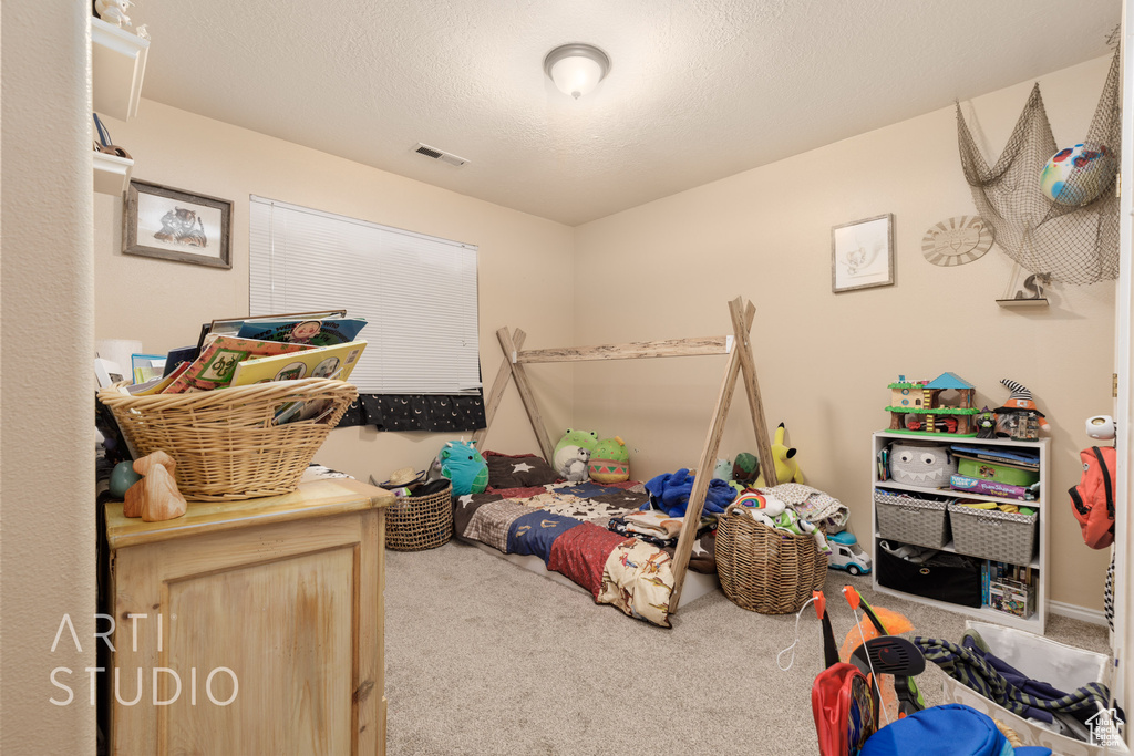Bedroom with carpet