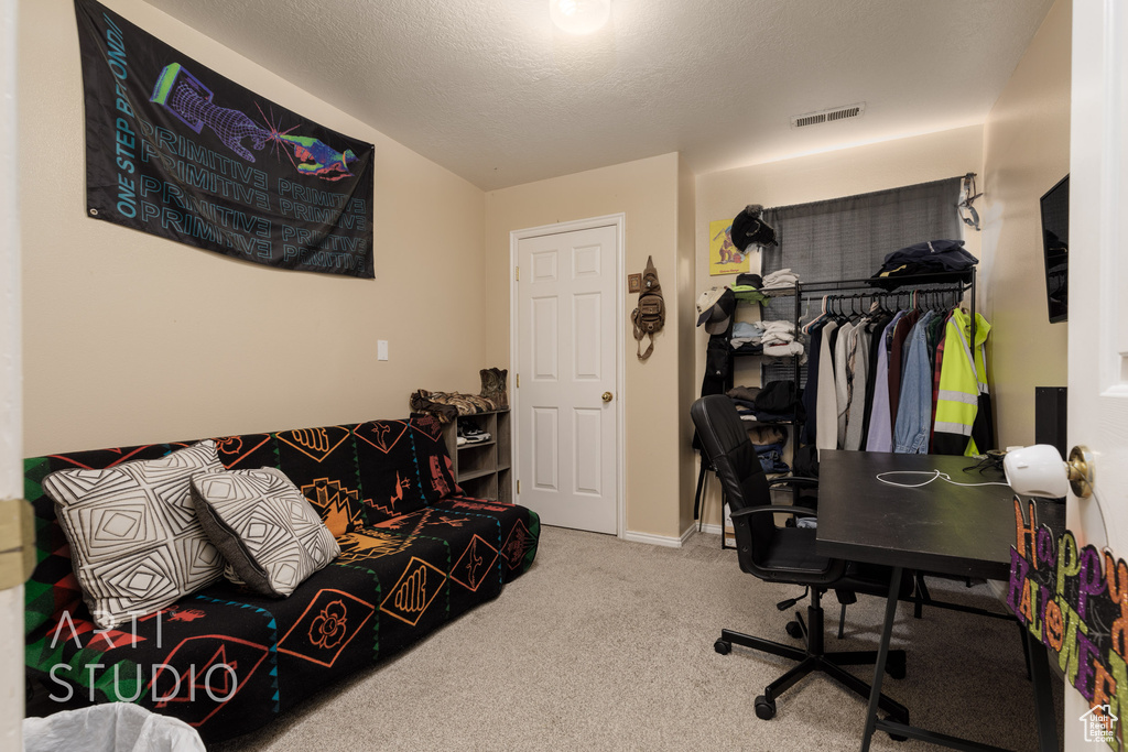 Office featuring carpet and baseboards