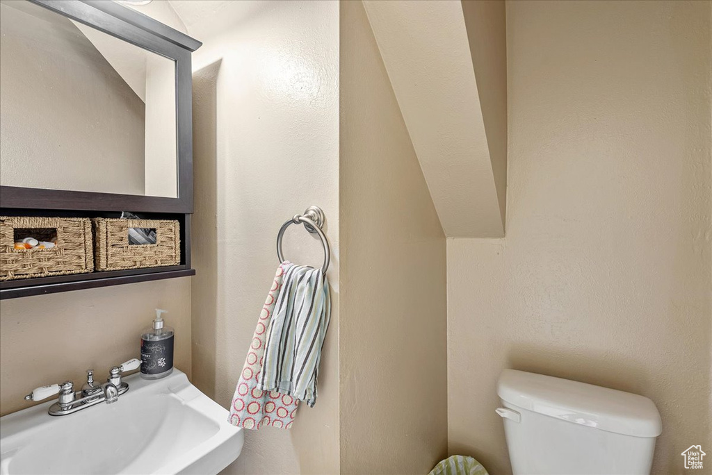 Bathroom with a sink and toilet