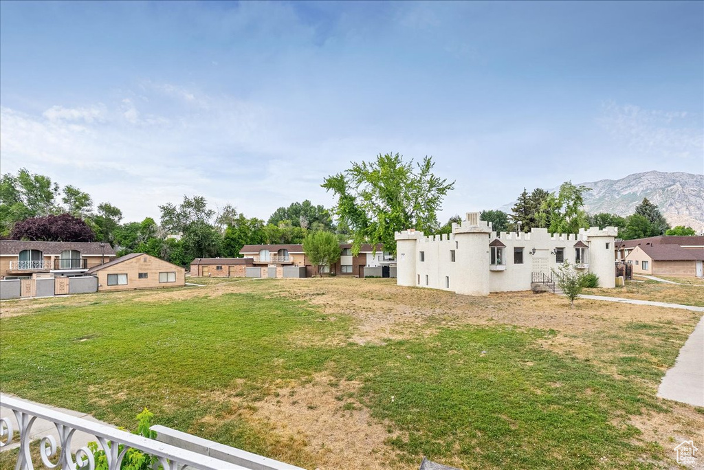 View of yard featuring a mountain view and a residential view