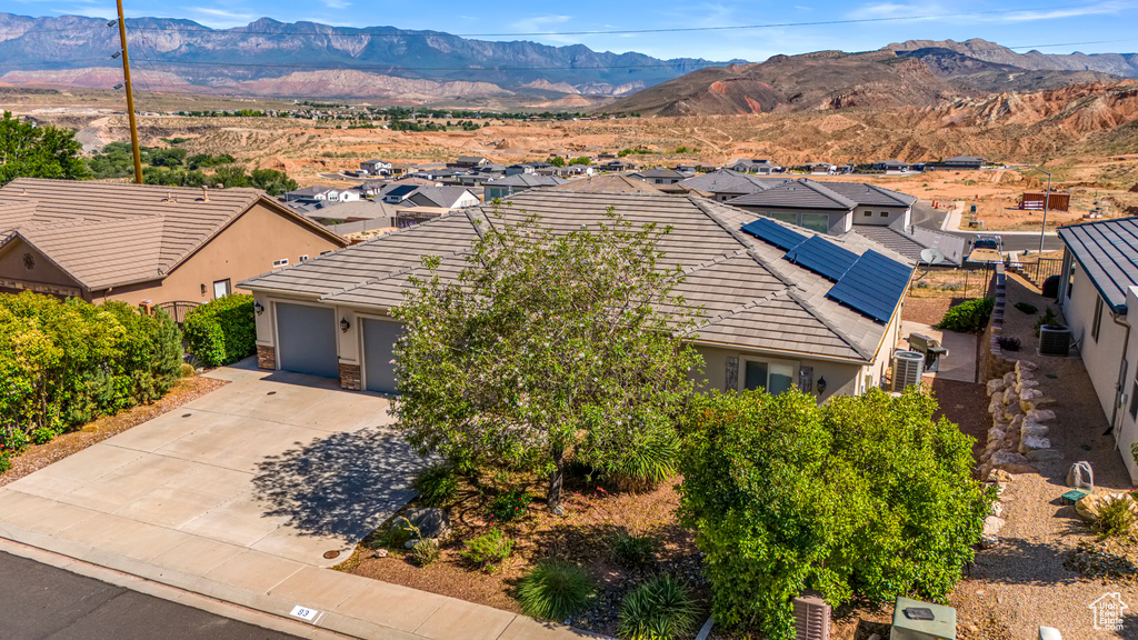 Aerial perspective of suburban area with mountains