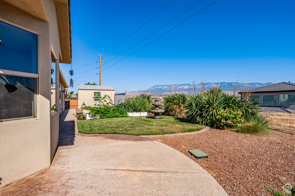 View of yard featuring a mountain view
