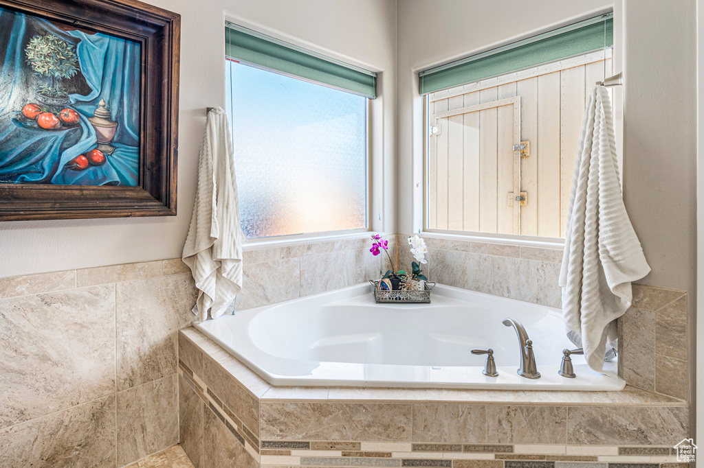 Full bathroom featuring a garden tub