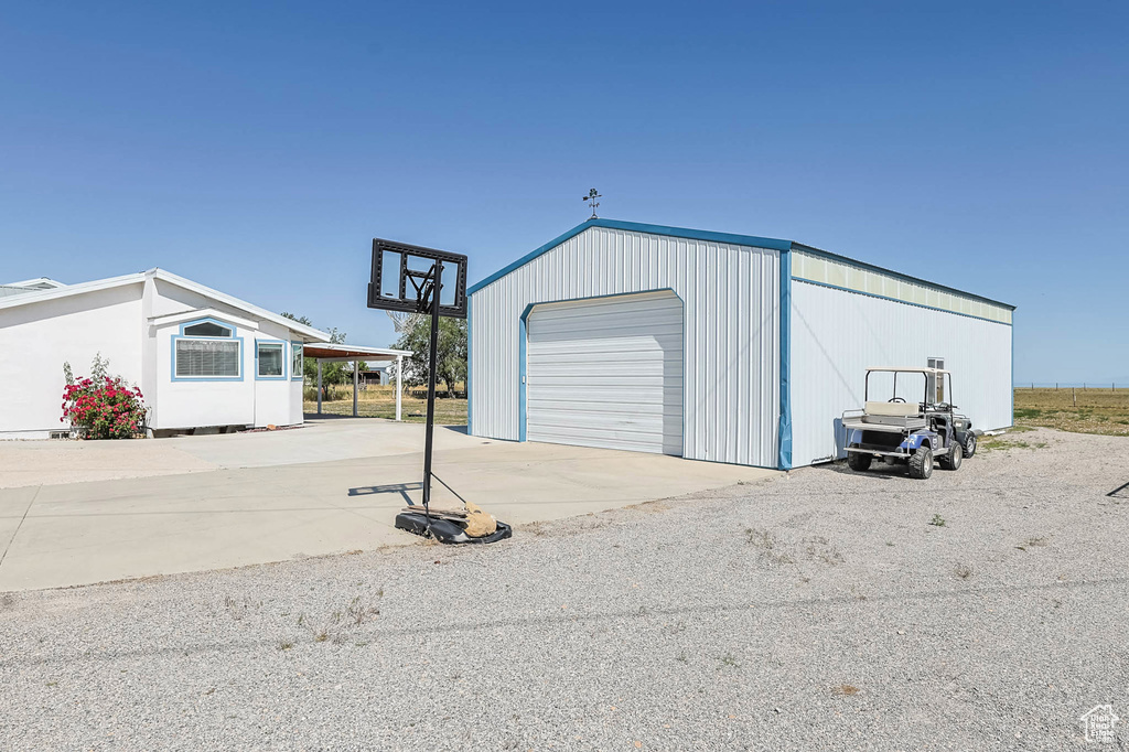 Detached garage with driveway