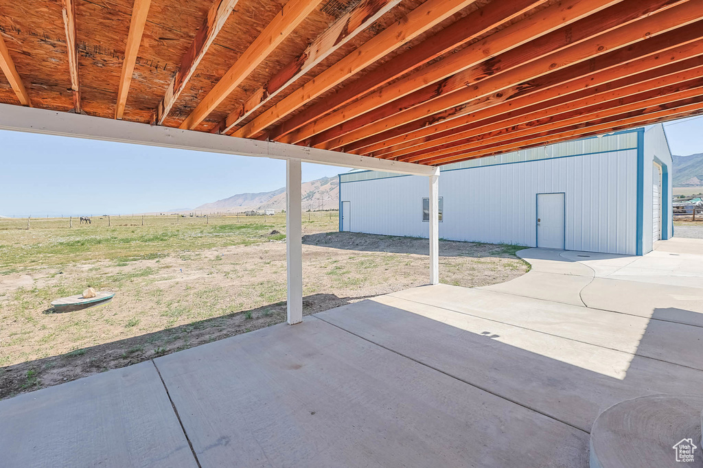 View of patio featuring a mountain view