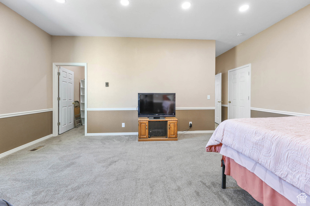 Bedroom featuring recessed lighting and light carpet