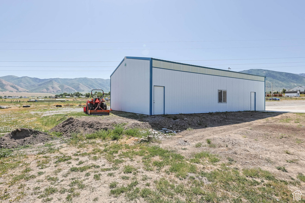 View of pole building featuring a mountain view