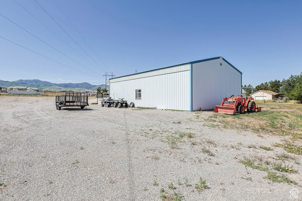 View of pole building featuring a mountain view