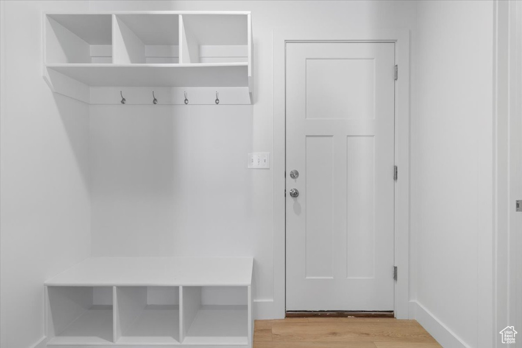 Mudroom with light wood-type flooring