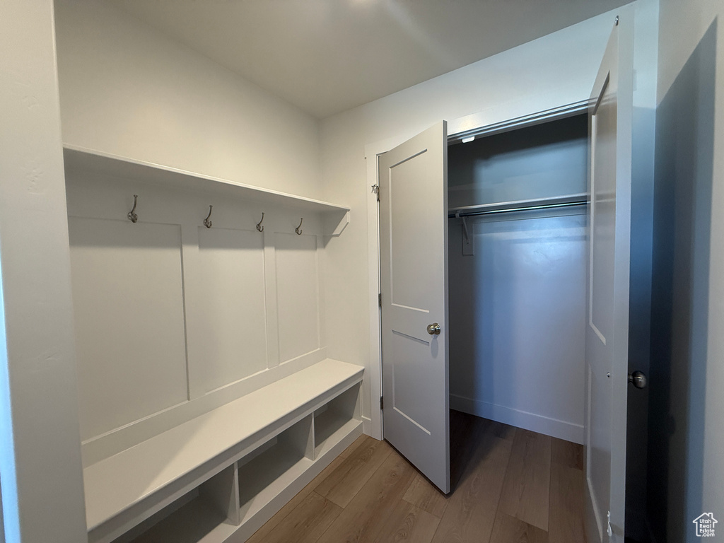 Mudroom featuring wood finished floors
