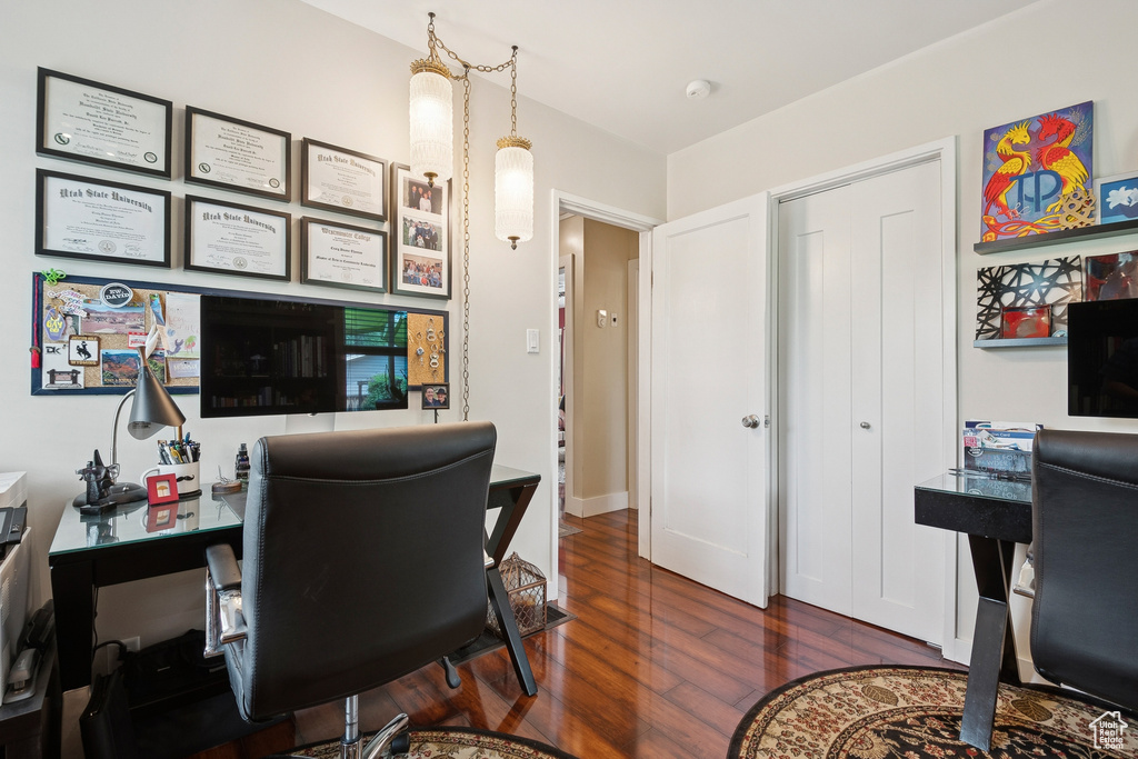 Office area featuring wood finished floors