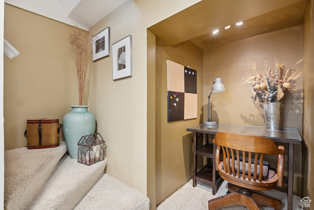 Hall featuring carpet flooring